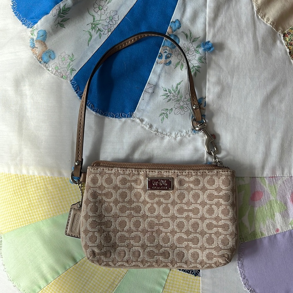 Small tan coach clutch/bag